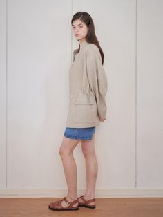 This is a casual and refined jacket that is made out of high quality cotton, rayon, and linen blend fabric. With design detail of adjustable string inside the waistband and light weight without lining, it gives a trendy and refined look. - Cool touch of linen blend fabric- Light weight without lining- Adjustable string inside the waist Casual Beige Linen Blazer, Beige Single Breasted Utility Jacket For Spring, Casual Beige Blazer For Spring, Chic Beige Single Breasted Utility Jacket, Beige Linen Outerwear For Spring, Beige Linen Spring Outerwear, Spring Beige Linen Outerwear, Spring Casual Beige Blazer, Casual Linen Utility Jacket For Spring