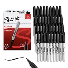 sharpie markers and marker pens are shown in front of the package, including one black marker