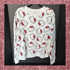 It’s Sweater Weather And What Better Way To Stay Warm Than To Snuggle Up With Hello Kitty. This Ultra Soft Sweatshirt Is Printed From Top To Bottom, Front To Back With Hello Kitty’s All Over. Extremely Comfortable And Easy To Care For. This Sweatshirt Is Brand New With Tags And An Official Sanrio Licensed Item. Brand New With Tags, Never Been Worn Machine Washable Size Large Measures 26” In Length And 24” In Width 60% Cotton And 40% Polyester White Casual Sweatshirt With Cat Print, Casual White Sweatshirt With Cat Print, White Casual Sweatshirt With Cat Design, Casual White Sweatshirt With Cat Design, Long Sleeve Cotton Tops With Cat Print, Casual Cotton Sweatshirt With Hello Kitty Print, White Long Sleeve Sweatshirt With Cat Print, White Long Sleeve Top With Cat Design, White Crew Neck Sweatshirt With Cat Print