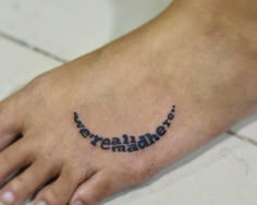 an image of a tattoo on someone's foot