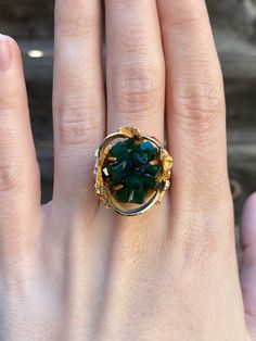 Total Weight: 18.8 grams Size: 6 Band Width: 2.8-5.1mm Face: 2.3x2cm  Rise: 1.6cm Emerald Cluster: approximately 15x18mm Condition: In great condition showing little wear with no damage. All gold has been thoroughly checked with an Olympus XRF spectrometer. It is guaranteed 14k gold.  All our jewelry is properly washed and disinfected to ensure customers get clean items with every order.  Returns accepted but may be subjected to a restock fee.  Please message with any questions:) Emerald Crystal, Jewelry Real, Crystal Ring, Crystal Rings, Estate Jewelry, Rings Statement, Statement Rings, Emerald, Jewelry Rings