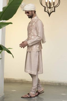 Apricot bundi with all over kashmiri floral embroidery. Paired with an inner kurta with embroidered hem and churidar. - Aza Fashions Kurta Set Men, Kurta Set For Men, Embroidered Hem, Nehru Jacket, Cotton Embroidery, Churidar, Kurta Set, Aza Fashion, Floral Embroidery