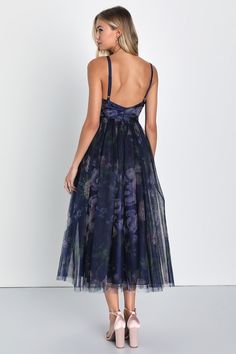 Looking playful and poised at the same time is easy to do when you have the Lulus Elaborate Elegance Navy Floral Print Tulle Pleated Midi Dress! This dress is sure to catch anybody's eye with its airy tulle construction that boasts a lovely floral print throughout as it shapes a flattering surplice neckline and an intricately pleated bodice (with a subtle, low-cut back), all supported by satin-y, adjustable straps. Layers of tulle beneath the ballgown-inspired skirt lend a voluminous finish abov Pleated Floral Dress, Floral Wedding Guest Dress Spring Summer, Elegant Midi Dress Wedding, Midi Dress Tulle, Purple Flower Dress, Pleated Tulle Dress, Latest Dress Styles, Fit And Flare Midi Dress, Floral Tulle Dress