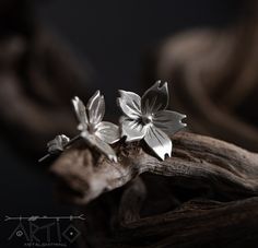 🌸 Pair of handforged stud earrings made of top quality recycled sterling silver.  🌸 Inspired by the delicate allure of cherry blossom flowers and the vibrant essence of the season, these earrings encapsulate the beauty of nature in every detail. 🌸 Whether you're dressing up for a special occasion or adding a touch of elegance to your everyday attire, these earrings are the perfect accessory to elevate your style. 🌸 You will receive the pendant shown in the photographs. 🌸 By choosing one of Cherry Blossom Flowers, Sterling Silver Stud Earrings, Flower Stud, Recycled Silver, Silver Stud Earrings, Floral Jewellery, Flower Earrings Studs, Flower Studs, Blossom Flower