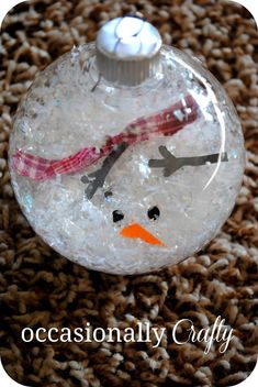 a snowman ornament is shown on the carpet