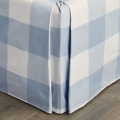 a blue and white checkered bed skirt