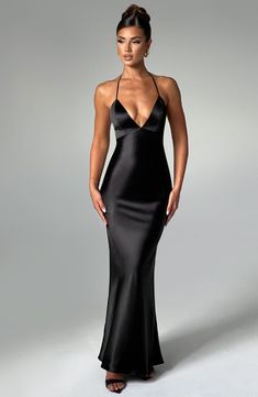 From engagement party to chapel ceremony, whatever the dress code, wear Delphine for every special occasion. Crafted in our premium non-stretch satin with a beautiful sheen, this maxi dress has a plunge halter neckline, super low scoop back with delicate elastic straps. Wear with a chic, undone hair up and metallic accessories. 



Colour: Black.

Premium non-stretch satin.

Plunge halter neckline.

Hook closure on neck.

Elastic straps to back.

Low scoop back.

Invisible zipper to reverse.

Ma Satin Black Dress, Undone Updo, Black Halter Neck Dress, Chapel Ceremony, Homecoming Dresses Corset, Undone Hair, Plunging Dress, Slippers Outfit, Midi Dress Wedding Guest