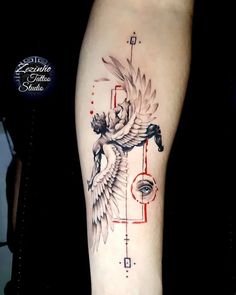 a tattoo on the leg of a person with an eye and bird in front of it