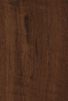 a wooden surface with dark brown wood grains