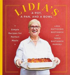 an older woman holding a casserole dish in front of a red background with the words lidia's, a pan and a bowl