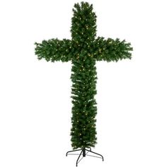 a christmas tree with a cross on the top and lights in the bottom part of it