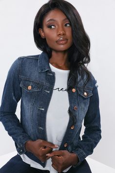 Keep it cool & keep it casual in our Women's Classic Fit Denim Jacket. Designed to fall just above the waist and showcase subtle distressed detailing for that edgy feel. Featuring buttoned flap pockets on front, functional side pockets, 6 button front closure, a classic collar, and button-cuff long sleeves. Due to the nature of the novelty wash process and hand-crafted design, each garmet will have a unique appearance. Measurement (Based on size M) - Sleeve Length (From shoulder seam): 22” - Len Trendy Dark Wash Denim Jacket, Trendy Dark Wash Denim Jacket For Everyday, Casual Distressed Denim Jacket For Fall, Ripped Denim Blue Jacket, Ripped Medium Wash Denim Jacket For Fall, Fall Medium Wash Ripped Denim Jacket, Distressed Denim Blue Jacket For Fall, Distressed Denim Jacket For Everyday Fall Wear, Casual Ripped Fitted Denim Jacket