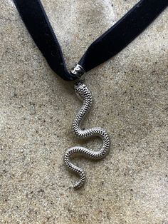 Vintage ornate Snake in Stainless steel silver finish About 1 inch long plus bale All jewelry is shipped in a nice gift box.   Check out our over a THOUSAND great reviews Silver Snake Necklace For Party, Silver Symbolic Snake-shaped Necklace, Silver Snake Necklace With Symbolic Style, Vintage Snake-shaped Jewelry Gift, Vintage Snake Chain Jewelry Gift, Vintage Snake Jewelry For Gifts, Vintage Snake Chain Jewelry As Gift, Symbolic Silver Snake-shaped Jewelry, Symbolic Silver Snake Jewelry