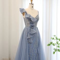 Spaghetti Strap Evening Dress With Sweep Train For Banquet, Elegant Light Blue Mermaid Dress For Prom, Elegant Light Blue Mermaid Dress For Prom Season, Elegant Light Blue Mermaid Hem Dress, Floor-length Tulle Mermaid Dress For Banquet, Blue Gala Gown With Spaghetti Straps, Blue Spaghetti Strap Gown For Gala, Light Blue Mermaid Dress For Prom, Light Blue Mermaid Hem Evening Dress For Wedding