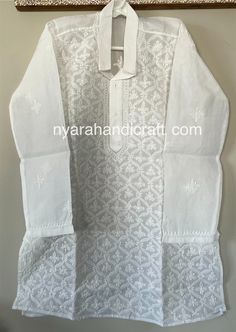 "Pure cotton Chikankari set for the little men ! This must have white Kurta Pajama set has very fine all over embroidery and \"darz\" appliqué work on the kurta." White Dabka Sherwani For Navratri, White Cotton Sherwani With Cutdana, White Cotton Kurta With Zari Work, White Straight Kurta Set For Festivals, Long Sleeve Cutwork Sets For Diwali, White Dabka Set For Puja, Cotton Traditional Wear With Cutwork For Eid, Traditional White Kurta For Summer, Traditional White Summer Kurta