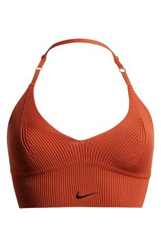 This moisture-wicking sports bra boasts light support to give you plenty of freedom as you move while an adjustable halter strap allows you to customize your fit. Slips on over head Adjustable halter strap Dri-FIT moisture-wicking technology 85% polyester, 12% nylon, 3% spandex Machine wash, line dry Imported Nordstrom x Nike: A curated lifestyle destination where fashion is the ultimate sport