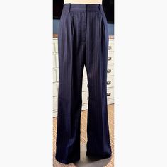 New With Tags Size 16 (Run Very Long) These Chic Tailored Pants By Favorite Daughter Are A Deep Navy Blue Color With White Pinstripes. The Pinstriped Pants Have A Pleated Front. They Are Well Made With A 100% Cotton Lining. The Outer Fabric Is 65 Polyester, 33% Rayon, & 2% Elastane. The Closure Is A Double Clasp & Zipper. The Dress Form Is Wearing A Size 8 Clipped In The Back To Fit. The Size 16 Pants Can Be Seen In All Of The Pictures Of The Pants Hanging On The Door. **** These Beautiful Blue Fitted Pinstripe Wide Leg Pants, Fitted Pinstripe High Waist Bottoms, Fitted High Waist Pinstripe Bottoms, High Waist Pinstripe Bottoms For Business Casual, Elegant High Waist Pinstripe Pants, Elegant High-waist Pinstripe Pants, Classic Striped Wide Leg Pants, Fitted Pinstripe Wide Leg Bottoms, Striped Wide Leg Formal Bottoms