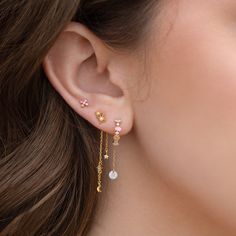 Introducing our enchanting Starry Night Dangle Earrings. With a charming 2-star stud and a dangle backing adorned with celestial detailing, this piece will have you shining as bright as the evening sky. In a beautiful fusion of dreamy design and twinkling elegance, our Starry Night Dangle Earrings will be a piece you'l Dainty Chain Earrings, Elegant Dangle Earrings With Star Charm, Dainty Star Charm Drop Earrings, Celestial Style Drop Earrings With Dangling Charms, Elegant Star-shaped Jewelry With Dangling Charms, 2 Ear Piercings, Minimalist Ear Piercings, Dreamy Design, Ear Art