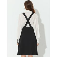 With nice quality fabric and a detailed design for the overall midi dress, this trendy item can freshen your wardrobe. Designed with a V neck, double-breasted decor, criss-cross back, faux flap pockets, and convenient adjustable straps, this suspenders skirt is unique. Soft slightly stretchy fabric and elastic waist design is comfortable all day long and easy to wear on and down. Classic but special, also is versatile to match each age, each style, and each occasion. Pair it with the blouse, but Elegant Party Dress With Suspenders, Elegant Knee-length Suspender Dress With Adjustable Straps, Long Sleeve Suspender Dress For Spring, Elegant Sleeveless Fake Two-piece Dress, Spring Mini Dress With Suspenders, Chic Formal Suspender Dress For Spring, Midi Length Dresses With Adjustable Straps For Work, Workwear Midi Dresses With Adjustable Straps, Elegant Fake Two-piece Dress For Work