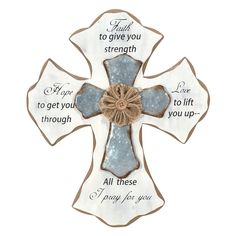 a metal cross with words on it that say, trust to give you strength and all these things for you