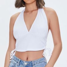 Plunging White Halter Top With Tie Up Sides From Forever 21 Size L Large. Brand New Never Worn. The Top Was Too Big For Me. A Knit Crop Top Featuring A Plunging Halter Neckline And Ruched Drawstring Sides. #Forever21 #Haltertop #White #Whitetop #Croptop Chic Low-cut Halter Top For Spring, Fitted Low-cut Tank Top For Spring, Spring Low-cut Halter Top For Beach, Low-cut Halter Top For Beach In Spring, Chic Low-cut Halter Top For Summer, White Low-cut Summer Top, White Low-cut Top For Summer, Low-cut Fitted Crop Top For Summer, Fitted Low-cut Crop Top For Summer