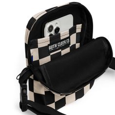 It's a Retro Revival! This bag is sturdy, stylish, and ready to go wherever you do. With adjustable straps and two spacious pockets, it’s the ultimate accessory for hiking, festivals, and everyday use. Featuring an all-over print of a retro black and cream checkerboard pattern, this crossbody bag adds a bold and timeless twist to any outfit. Perfect for a 90s-inspired back-to-school look, it's both functional and fashionable. Key Features: 100% polyester Fabric weight: 9.91 oz./yd.² (336 g/m²) B Retro Shoulder Bag For Streetwear, Retro Black Bag With Pockets, Retro Rectangular Bags For Outdoor Activities, Checkered Belt, Retro Revival, Bag Patches, Crop Top Sweatshirt, Festival Bag, Checkerboard Pattern