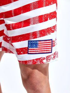 Celebrate your patriotism in style with our American Flag Print Swim Shorts. Crafted with care, these swim shorts showcase a vibrant and eye-catching design that proudly displays the stars and stripes of the American flag. Details: Pattern Type: Striped, Flag Details: Drawstring Type: Bottoms Bottom Type: Shorts Fabric: Non-Stretch Composition: 100% Polyester Care Instructions: Machine wash, do not dry clean Size Chart (Inches): Size US Bottoms Length Hip Size Waist Size S 36 16.9 41.7 29.1-40.9 Short Swim Trunks For Summer Sports Events, Summer Short Swim Trunks For Sports, Beach Shorts With Flag Print, Casual Beach Shorts With Flag Print, Short Shorts For 4th Of July Beach Events, Shorts For 4th Of July Beach Events, Summer Sports Shorts, 4th Of July Beach Shorts, Moisture-wicking Swimwear For Sports