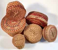 several woven baskets stacked on top of each other