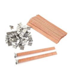 wooden pegs and pieces of wood on a white background