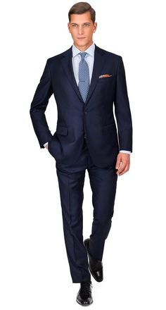 Our model is 6'1'' and wears a 40R jacket (waist taken in an additional 2'') and a size 30W pant. If you need any alterations, we'll cover up to $50 per suit - just email us the receipt from your local tailor.
The Solid Deep Blue Suit boasts a classy shade of blue that is rich & saturated, yet sufficiently conservative for just about any occasion. The Super 100s wool fabric, woven by Angelico in Italy delivers every quality a reliable everyday suit should possess - great drape, comfort and durab Navy Blue Suit Outfit, Deep Blue Suit, Navy Blue Suit Men, Sophisticated Men, Mens Office Wear, Dark Blue Suit, Dapper Mens Fashion, Black Outfit Men, Blue Suit Men