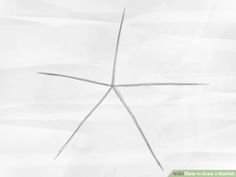 a cross drawn in the middle of white paper