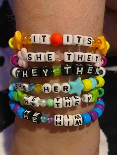 Custom personalized pronoun bracelets. All pronouns are welcomed! Our shop (+this listing) is a judgement free, welcoming zone ! Your arm will look beautiful in our amazing custom patterned kandi bracelets <3 We offer all colors of the rainbow, plus a few extra shades, and various specialty beads. If you have something specific in mind, please message us beforehand to see if it's possible! Please refer to the last photo to see an example of our variety :D Check out our shop for more listings: Pronoun Bracelets, Rave Bracelets, All Pronouns, Bracelets Kandi, Kandi Beads, Diy Kandi Bracelets, Kandi Inspo, Pony Bead Bracelets, Kandi Perler