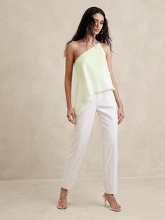 We cut this modern resort shirt with easy dolman sleeves and a relaxed fit.  For fabric, we selected our signature silk charmeuse—a favorite for its beautiful drape, satin-like shine, and ease of care.  Relaxed fit.  One-shoulder neckline.  Asymmetrical hem.  Relaxed fit.  Sleeveless.  Below hip length.  Model: Size S, 5'10" (178cm). Celery Green, Resort Shirt, Top Banana, Silk Charmeuse, Sleeveless Shirt, Asymmetrical Hem, Silk Top, Hip Length, Celery