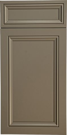 an image of a kitchen cabinet door with the bottom panel painted in beige and the bottom panel