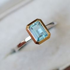 HelloWe are Lucky pay the attention for your welcome in our shop GemCARAT. You can find here very finely Handcrafted Jewelry with Natural Genuine Gemstones & Required Metal. PRODUCT SPECIFICATIONS **Main Stone Shape & Size : Natural Aquamarine Octagon Shape 8x6mm - 1Pc **Stone Color : Blue **Band Width : 1.50mm ** Metal : 14K Yellow +White ** Product Weight : 6.00gm OTHER SPECIFICATIONS This Brilliant Ring is made to order. Available in all the Required Materials like 925 Sterling Silver/9K/10K/ Gold Emerald-cut Blue Topaz Ring, Emerald Cut Sapphire Ring Stamped 14k, Aquamarine Solitaire Ring, Brilliant Ring, Bezel Set Diamond Ring, Blue Aquamarine Ring, Aqua Stone, Woman Ring, Gold Rings Stackable