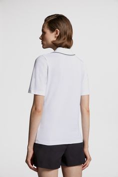 Crafted from cotton piquet, this polo shirt is featured in a slim fit. The classic style is embellished with a contrast color trim and logo patch. Sporty Collared Polo Shirt For Workwear, Sporty Striped Collar Top For Workwear, Polo Collar Top With Contrast Trim For Work, Workwear Polo Collar Top With Contrast Trim, Workwear Top With Polo Collar And Contrast Trim, Sporty Polo Shirt With Ribbed Collar For Work, Luxury Polo Shirt With Contrast Collar, Workwear Polo Shirt With Johnny Collar, Sporty Tops With Polo Collar And Contrast Collar