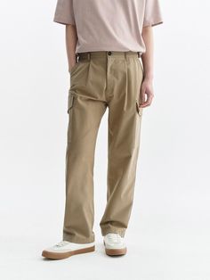 It is a casual relaxed fit cargo pant with pleats on the front. Made of tencel and cotton blend fabric, the pant has smooth texture and soft touch and is durable. It has elastic band on the back of the waist and casual mood.- Relaxed fit- Side pockets- Back pockets- YKK zipper Solid Color Relaxed Fit Cargo Jeans With Multiple Pockets, Relaxed Fit Solid Cargo Jeans With Multiple Pockets, Relaxed Fit Cargo Pants Utility Style, Relaxed Fit Cargo Pants In Utility Style, Solid Relaxed Fit Cargo Jeans With Multiple Pockets, Relaxed Fit Utility Chinos With Patch Pockets, Utility Chinos With Patch Pockets And Relaxed Fit, Relaxed Fit Solid Color Cargo Jeans, Relaxed Fit Cotton Cargo Jeans With Welt Pockets