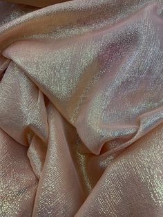 a close up view of a shiny fabric