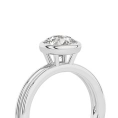 Crafted with exquisite detail, this Coupled Round Bezel Ring features a brilliant round lab-grown diamond nestled within a unique dual-band design. One band gleams in lustrous white gold, while the other elegantly contrasts in either romantic rose gold or striking yellow gold. All white gold option is also available. This solitaire diamond ring perfectly blends contemporary sophistication and classic charm, making it an ideal choice for engagements, anniversaries, or simply as a symbol of enduri Timeless Solitaire Jewelry With Round Band, 14k White Gold Rings With Brilliant Cut, Timeless Promise Diamond Ring, Promise Halo Ring With Brilliant Round Cut, Diamond Solitaire Round Rings, White Round Cut Halo Ring For Promise Occasion, Silver Moissanite Diamond Ring, Cushion Cut, Timeless Diamond Solitaire Halo Ring, White Round Cut Halo Ring For Promise