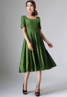 "This Prairie Linen dress is designed with soft linen in forest green hues, perfect with Puff sleeve, round neckline, and back button closure, This womens swing dresses can be styled with light weight a accessories for a daring ensemble . vintage inspired design, Handmade by Xiaolizi. DETAILS 50% linen, 50% Cotton, Medium weight Linen No lining Square neckline Short Puff Sleeve Seam pockets Back Zipper Below Knee length Spring, Summer House dress More color and More size https://etsy.me/2TGUAgq Green Linen Dress, Scoop Neck Midi Dress, Handmade Skirts, Outfit Party, Wool Clothing, Vintage Inspired Dresses, Prairie Dress, 50s Dresses, Mod Dress