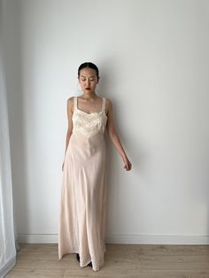 Vintage retro 1930s 1940s lace peach pink bias cut  silk lace dress material: pure silk chiffon  Size: around M,  Model wears size S, 36, 166cm 53kg pit to pit: 41 cm waist:50cm Full length 140cm condition: good antique condition Please keep in mind that this is almost 100 years old. It may have small marks and/or snags and sign of wear throughout. Please purchase willing to accept all signs of wear. NOTE For shop updates and extra info please follow me on Instagram: @shikivintage    *SHIPPING - Vintage Beige Sleep Dress, Vintage Cream Lace Slip Dress, Vintage Lace Trim Slip Dress For Sleep, Vintage Slip Dress With Lace Trim For Sleep, Vintage Lace Slip Dress For Evening, Vintage Lace Evening Slip Dress, Rose Pastel, Chiffon Lace, Peach Pink