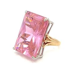 Giant Large Rectangular Pink Cubic Zirconia ~ 14k Yellow, White Gold Two Tone Statement Ring- Baby Pink  Handmade Setting  Size 7.5 - ET1670 This ring will definitely get noticed. It features a significant, rectangular-shaped pink cubic zirconia gemstone as its centerpiece. The setting is  handmade to fit the stone, rather than mass-produced by machines. Much attention to has been paid to the details.  Ring Size: 7.5 Metal Content: 14k Yellow  and White Gold Gemstone: Cubic Zirconia Size in mm: 25 x 18mm Face of Ring (North/South): 25mm Height of ring off of finger: 11mm Ring Shank Width: 2mm Weight: 18.54 Grams Stamps: 14k  Condition: Excellent Pre-owned Condition Each piece is thoroughly examined and refinished as needed by our professional jewelers, tested to guarantee metal content,  g Harry Winston Pink Diamond Ring, Dazzling Brilliant Cut Rectangular Diamond Ring, Pink Gold Jewelry With Center Stone For Formal Occasions, Formal Pink Gold Jewelry With Center Stone, Luxury Rectangular Diamond Ring With Accent Stones, Formal Diamond Ring With Prong Setting And Rectangle Stone, Fine Jewelry Rectangular Diamond Ring For Formal Occasions, Formal Rings With Rectangular Center Stone, Luxury Diamond Ring With Rectangular Stone For Anniversary