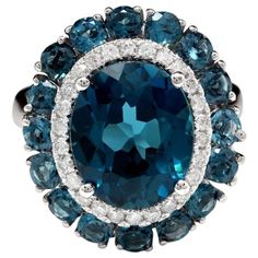 8.45 Carats Natural Impressive London Blue Topaz and Diamond 14K White Gold Ring Total Natural London Blue Topaz Weight: Approx. 8.00 Carats Center Topaz Weight is Approx. 7.00 Carats Center London Blue Topaz Measures: Approx. 12.00 x 10.00mm Natural Round Diamonds Weight: Approx. 0.45 Carats (color G-H / Clarity SI1-SI2) Ring size: 7 (we offer free re-sizing upon request) Ring total weight: Approx. 6.7 grams Disclaimer: all weights, measurements and colors are approximate and may vary slightly Emerald Cut Aquamarine Ring, Emerald Cut Rings, Gold Cocktail Ring, Blue Sparkles, Pink Topaz, Star Jewelry, 14k White Gold Ring, White Gold Ring, London Blue Topaz