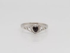 Vintage Sterling Silver Garnet Heart Filigree Ring ...Marked 925...Total of weights 1.7grams...Size 7...Measure of Face 6.6MM...It's in very good condition. B Simple Vintage Jewelry, Silver Vintage Ring, Hallmarked Heart Ring For Valentine's Day Formal, Formal Hallmarked Heart Ring For Valentine's Day, Silver Rings With Hallmarks For Valentine's Day, Silver Heart Ring With Birthstone For Formal Occasions, Formal Silver Heart Ring With Birthstone, Engraved White Gold Heart Ring, Valentine's Day White Gold Engraved Heart Ring