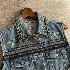 Vintage Bill Blass Denim Embroidered Vest New With Tags Size Small Casual Embroidered Denim Vest For Spring, Bohemian Denim Jacket With Floral Embroidery For Summer, Summer Bohemian Denim Jacket With Floral Embroidery, Bohemian Floral Embroidered Denim Jacket For Summer, Embroidered Casual Denim Jacket For Summer, Summer Cotton Denim Vest With Floral Embroidery, Casual Denim Jacket With Floral Embroidery For Festivals, Casual Embroidered Denim Jacket For Summer, Casual Embroidered Denim Vest For Summer