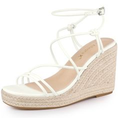 This beautiful espadrille sandal has strappy contoured cushioning and a supportive wedge heel give a long-lasting comfort. Flexible adjustment of the length of the rope to replace the unique design of the ankle strap. Strappy Lace up Sandals; Espadrille Design; Wedge Heels; Low Platform; Open Toe; Vamp: Faux Leather; Outsole: TPR; Heel: Espadrille+EVA; Heel Height: 3 8/9 inches; Platform Height: 1 inches. High Heel Synthetic Wedge Sandals For Beach Season, High Heel Wedge Sandals For Beach Season, Straw Wedge Sandals With Ankle Strap And Cushioned Footbed, Straw Wedge Sandals With Cushioned Footbed And Ankle Strap, Synthetic Wedge Heels For Beach Season, Adjustable Strappy Platform Wedge Sandals, Adjustable Strappy Wedge Sandals For Vacation, Synthetic Ankle Strap Espadrilles With Cushioned Footbed, Synthetic Espadrilles With Cushioned Footbed And Ankle Strap