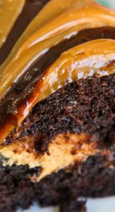 a piece of chocolate cake with caramel icing