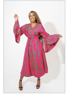 Make a bold statement in this in this African print wrap dress. It wraps around you like a robe with two straps to cinch the waist. It fits up to a 55" bust and has a length of 54". 100% cotton. Machine wash in cold water. Gentle cycle dry. Linen Wrap Dress With Tie Waist, Beach Wrap Dress With Belt, Pink Wrap Dress With Tie Waist And Surplice Neckline, Pink Wrap Dress With Tie Waist, Summer Wrap Dress With Kimono Sleeves And Belted Waist, Summer Wrap Dress With Kimono Sleeves And Belt, Green Tie Waist Wrap Dress For Vacation, Pink Wrap Dress For Summer, Pink Wrap Dress For Spring