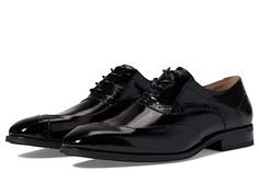 Stacy Adams Gillam Lace-Up Oxford - Men's Shoes : Black : Try a new look by wearing the stylish and trendy Stacy Adams Gillam Lace-Up Oxford Shoes. Leather upper, lining, and insole. Fully-cushioned insole with memory foam to ensure superior cushioning. Classic lace-up closure. Square toe and stacked block heel. Wingtip design with brogue detailing. Man-made outsole with high traction and durability. Imported. Measurements: Weight: 15.5 oz Product measurements were taken using size 9, width M. P Classic Lace-up Synthetic Oxfords, Elegant Synthetic Lace-up Oxfords, Synthetic Oxfords With Leather Sole And Round Toe, Synthetic Low-top Oxfords With Leather Sole, Synthetic Dress Shoes With Textured Sole And Round Toe, Low-top Synthetic Oxfords With Leather Sole, Spring Patent Leather Lace-up Shoes, Synthetic Wingtip Oxfords With Rubber Sole, Synthetic Wingtip Oxfords With Leather Sole