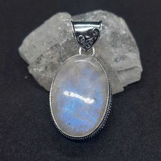 Moonstone Pendant, Rainbow Moonstone Gemstone Handmade 925 Sterling Silver Jewelry Pendant For Women's Gifts, Gemstone Jewelry For Her Desc : Metal : 925 Sterling Silver Setting - Bezel setting Stone : Rainbow Moonstone Pendant Size : 2 Inch Approx Color : As in Image Shape - Oval Gemstone Creation: Natural Gemstone  Gemstone Cut: Smooth Cabochon Stone Size :  mm Approx Pendant For Mother's Day Gift Pendant For Father's Day Gift Pendant For Promise Pendant For Valentine' Day Pendant For Hallowee Natural Silver Moonstone Gemstones, Handmade Silver Moonstone Gemstones, Oval Silver Moonstone Gemstones, Round Moonstone Jewelry With Stones, Silver Moonstone Pendant Gemstones, Silver Labradorite Moon-shaped Jewelry, Silver Moonstone Gemstones For Healing, Rainbow Moonstone Pendant, Silver Jewelry Pendant